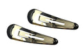Two gold hair clips on a white background