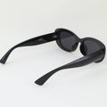 Black sunglasses on a white background