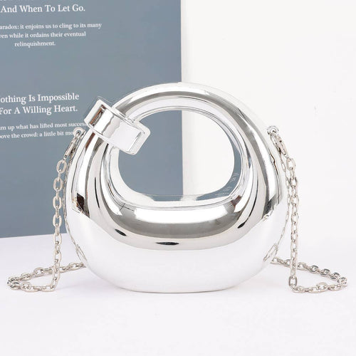 Silver round handbag with chain strap on a white background