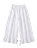 White wide-leg cropped pants with an elastic waistband, lace trim at the hem, and drawstring ties, shown against a plain white background.