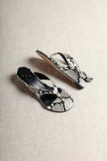 Aurora Snake-Embossed Leather Wedge Thong Sandals on white background