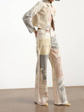 Person wearing a unique outfit with patterned pants and jacket on a plain background
