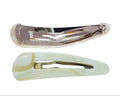 Two hair clips, one silver and one beige, on a white background with 'French Anie' branding.
