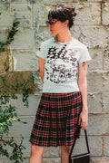 woman wearing blue philly tee and plaid skirt