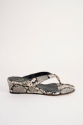 Black leather mule shoe on a white background