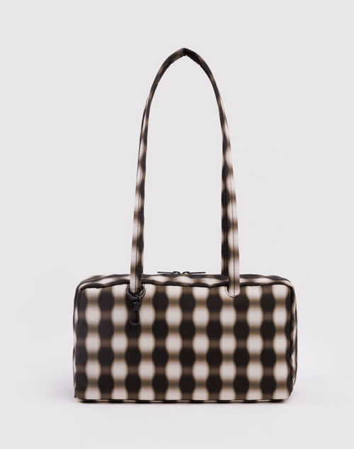 Black and white checkered handbag on a light gray background