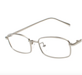Silver eyeglasses on a white background