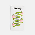 Set of green hair clips with pink flowers on a white card labeled 'Chunks'.