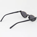 Black sunglasses with a unique design on a white background