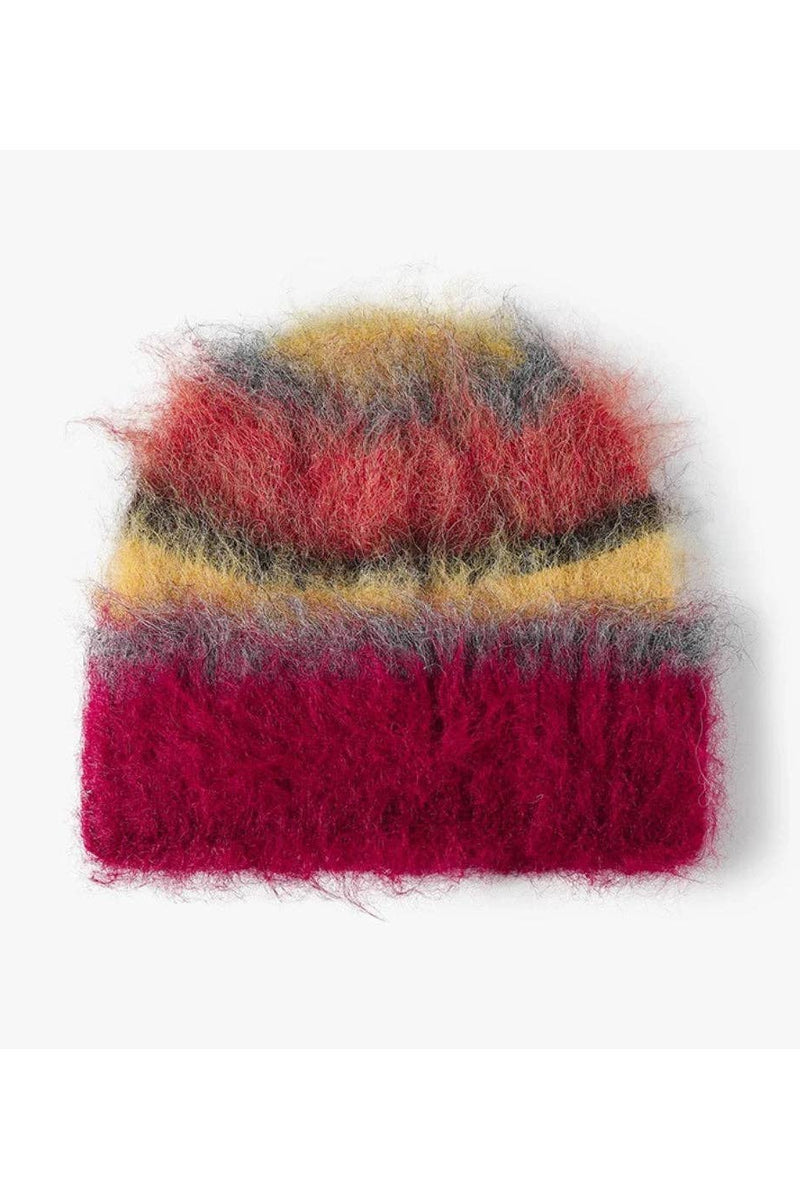 A fuzzy, mohair-style knit beanie hat with horizontal stripes of magenta pink, yellow, and gray, shown against a plain white background.