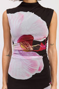 Sleeveless top with abstract floral design on a plain background