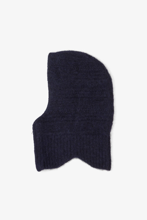 Dark blue knitted balaclava on a white background