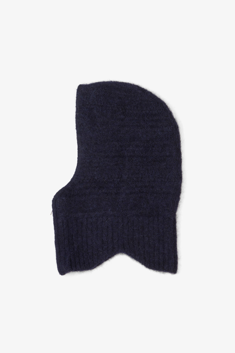 Dark blue knitted balaclava on a white background