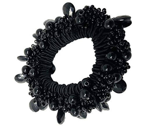 Black beaded scrunchie on white background