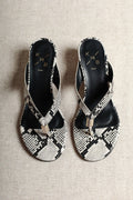 Aurora Snake-Embossed Leather Wedge Thong Sandals on white background