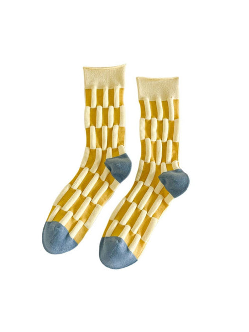 Pair of socks with a geometric pattern on a white background