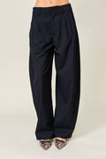Black pinstripe pants on a white background