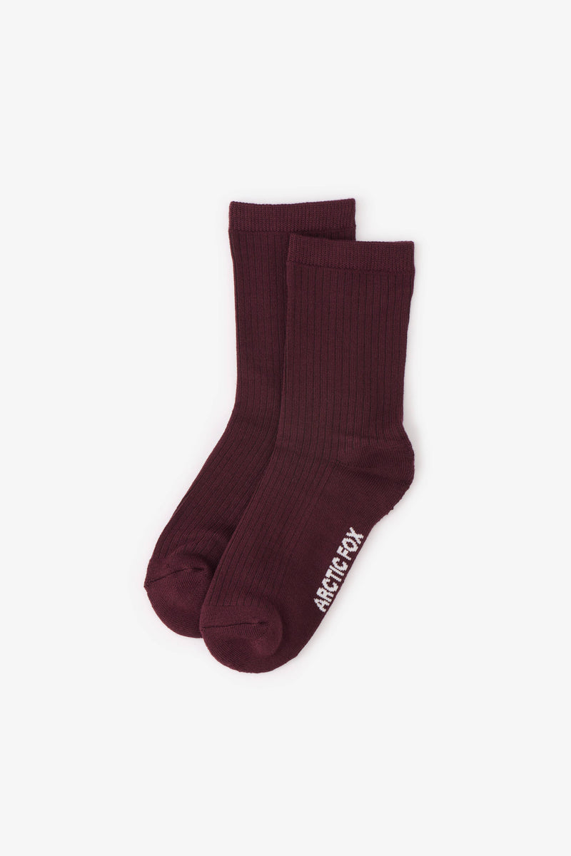 Pair of maroon socks with a brand logo on a white background