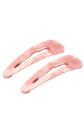 Two light pink hair claw clips with a glossy finish, displayed on a clean white background.